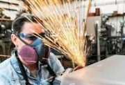 female wearing safety glasses saves eyes while welding